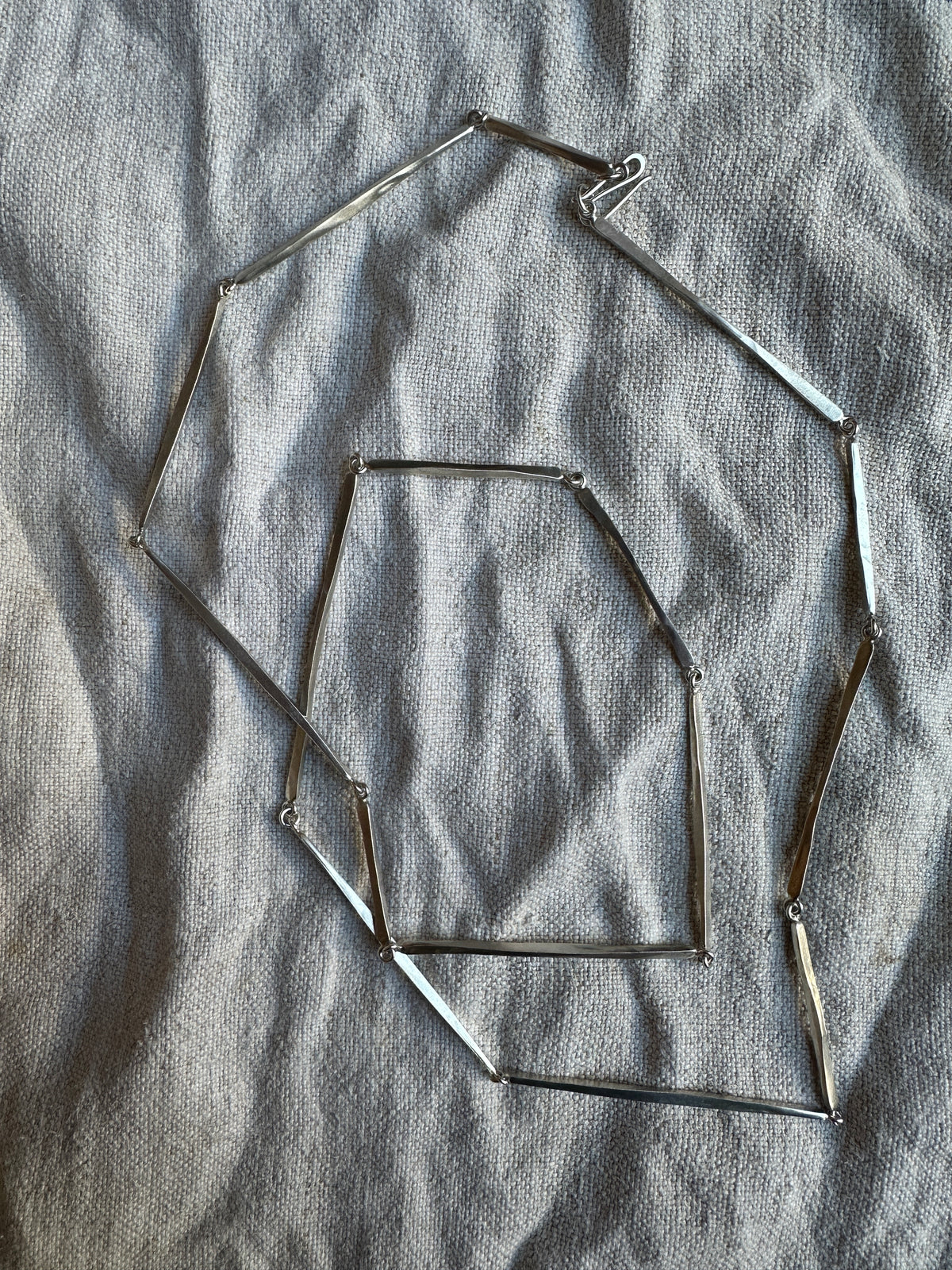 Silver long linear hammered necklace