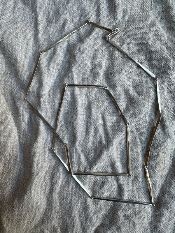 Silver long linear hammered necklace