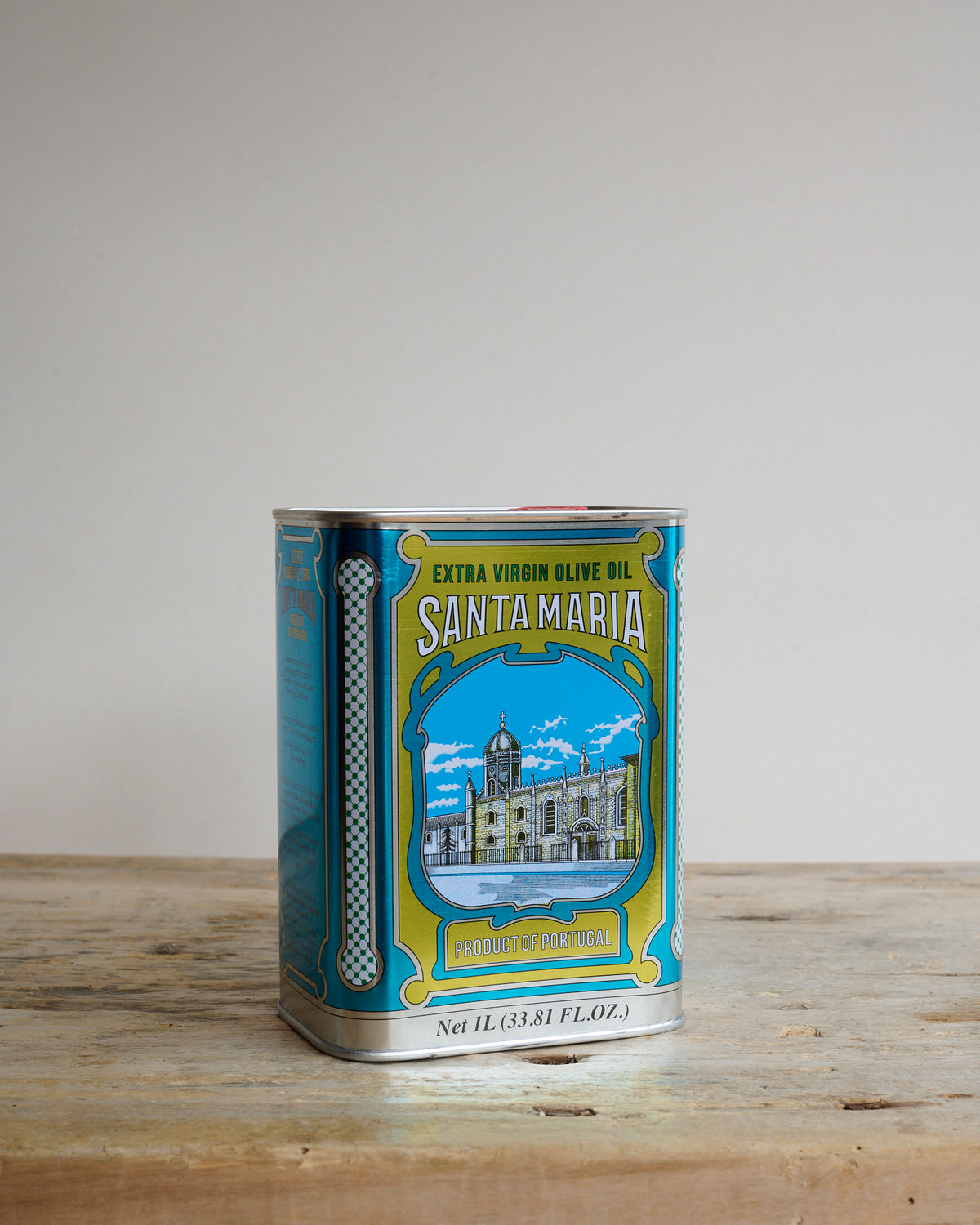 Tin can of Santa Maria Extra Virgin Olive Oil with traditional portuguese designs