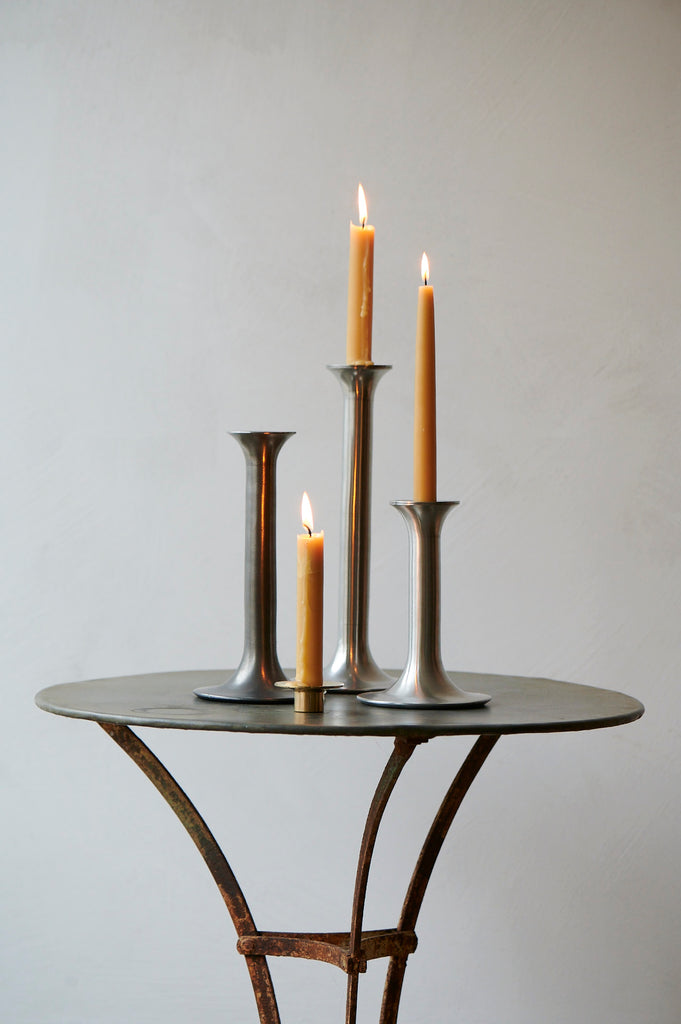 Pewter candlesticks with beeswax candles