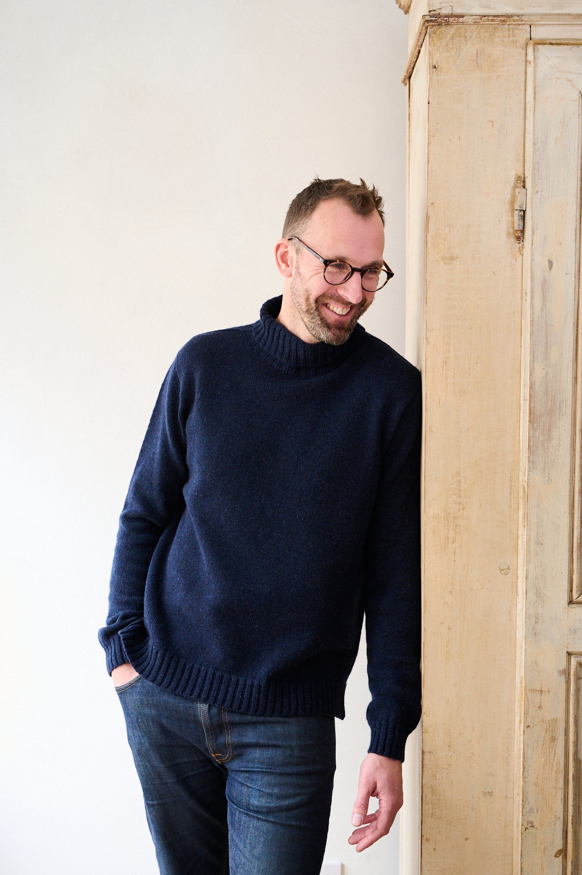 Men's roll neck jumper in Indigo