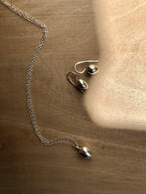 Silver egg pendant necklace