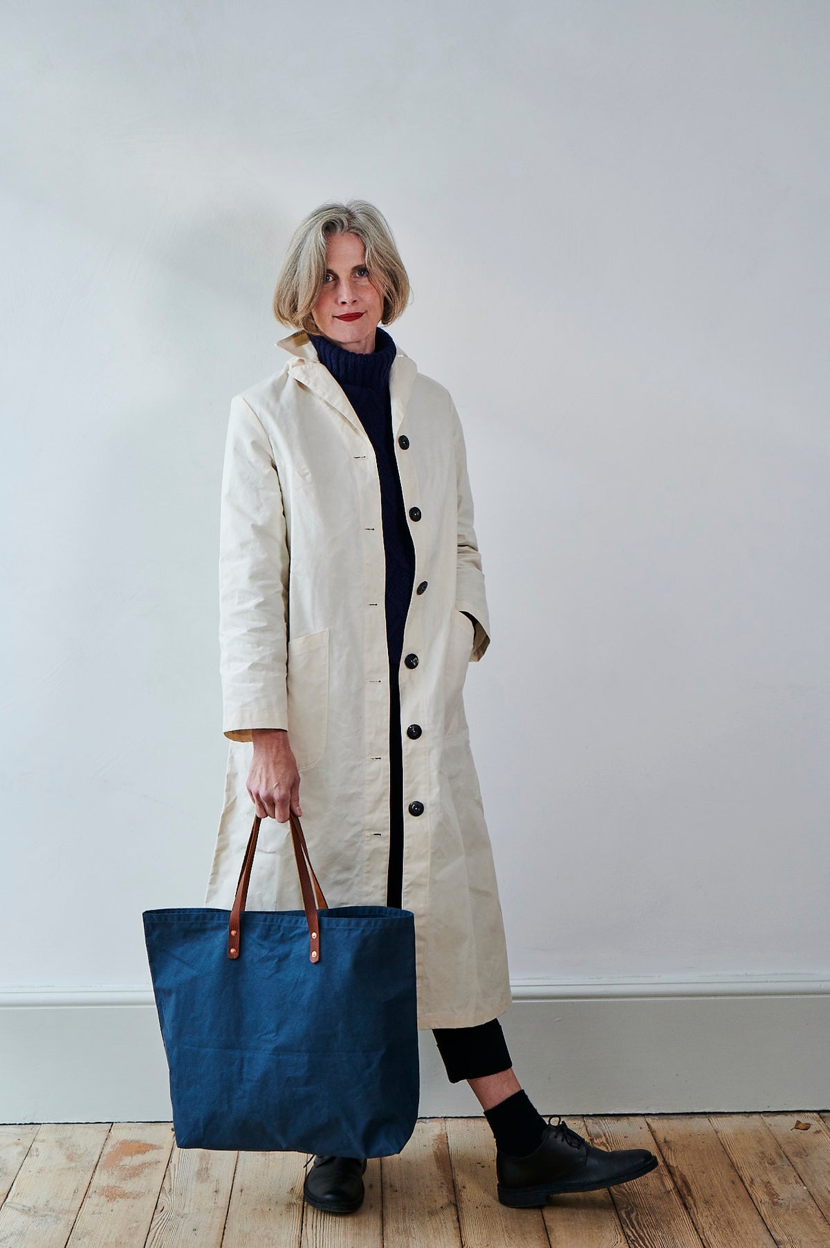 Blue waxed cotton bag with leather straps by Freight HHG