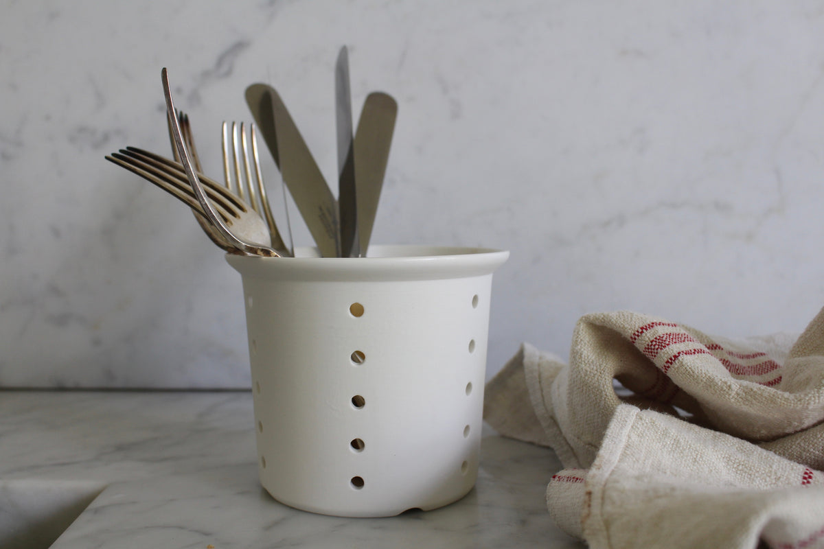 White Cutlery Drainer on Marble Worktop
