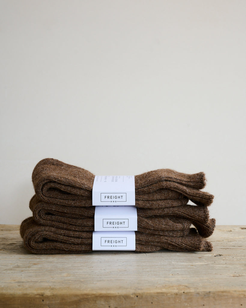 Soft Brown Alpaca Socks in a stack