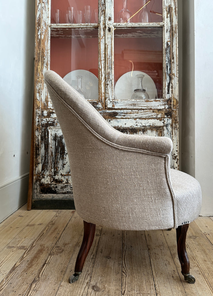 Newly upholstered linen covered armchair
