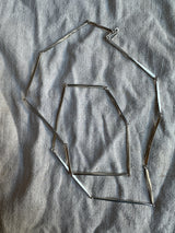 Silver long linear hammered necklace