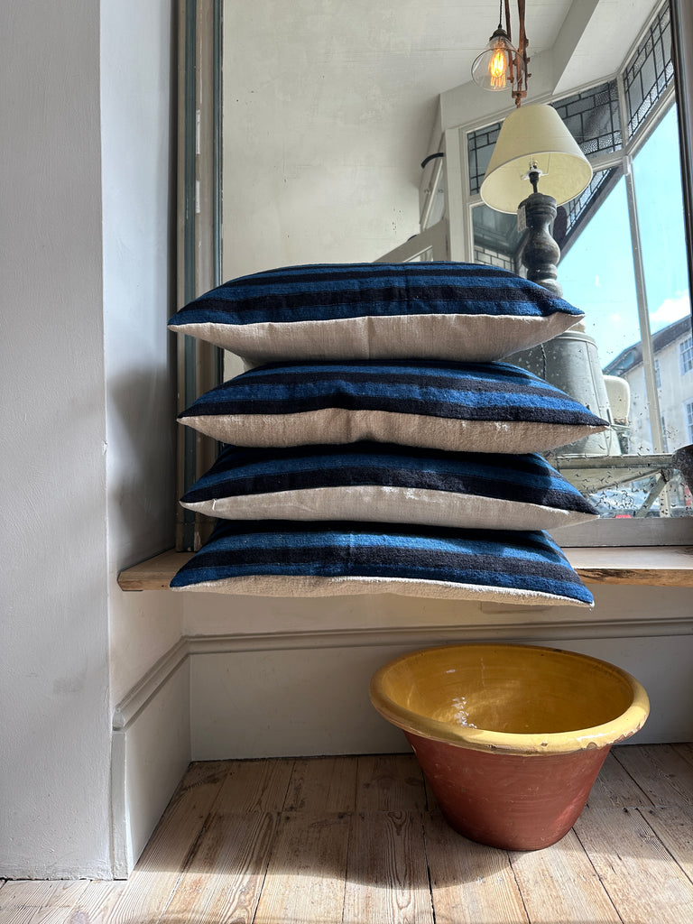 Stack of cushions made from vintage dutch fabric
