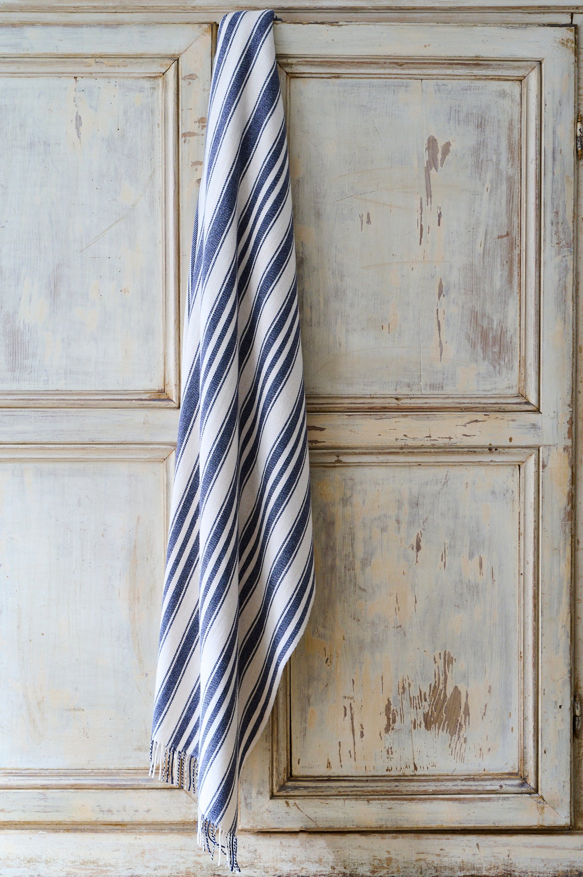 Super soft striped indigo blanket made in the UK