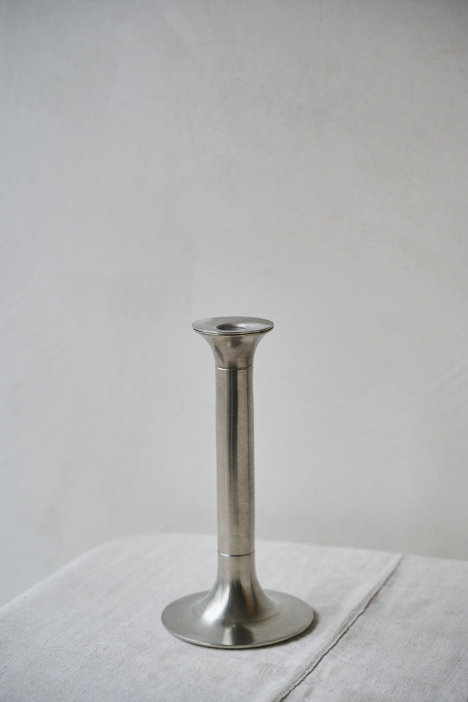 Medium pewter candlestick in chrome finish with two grooves 
