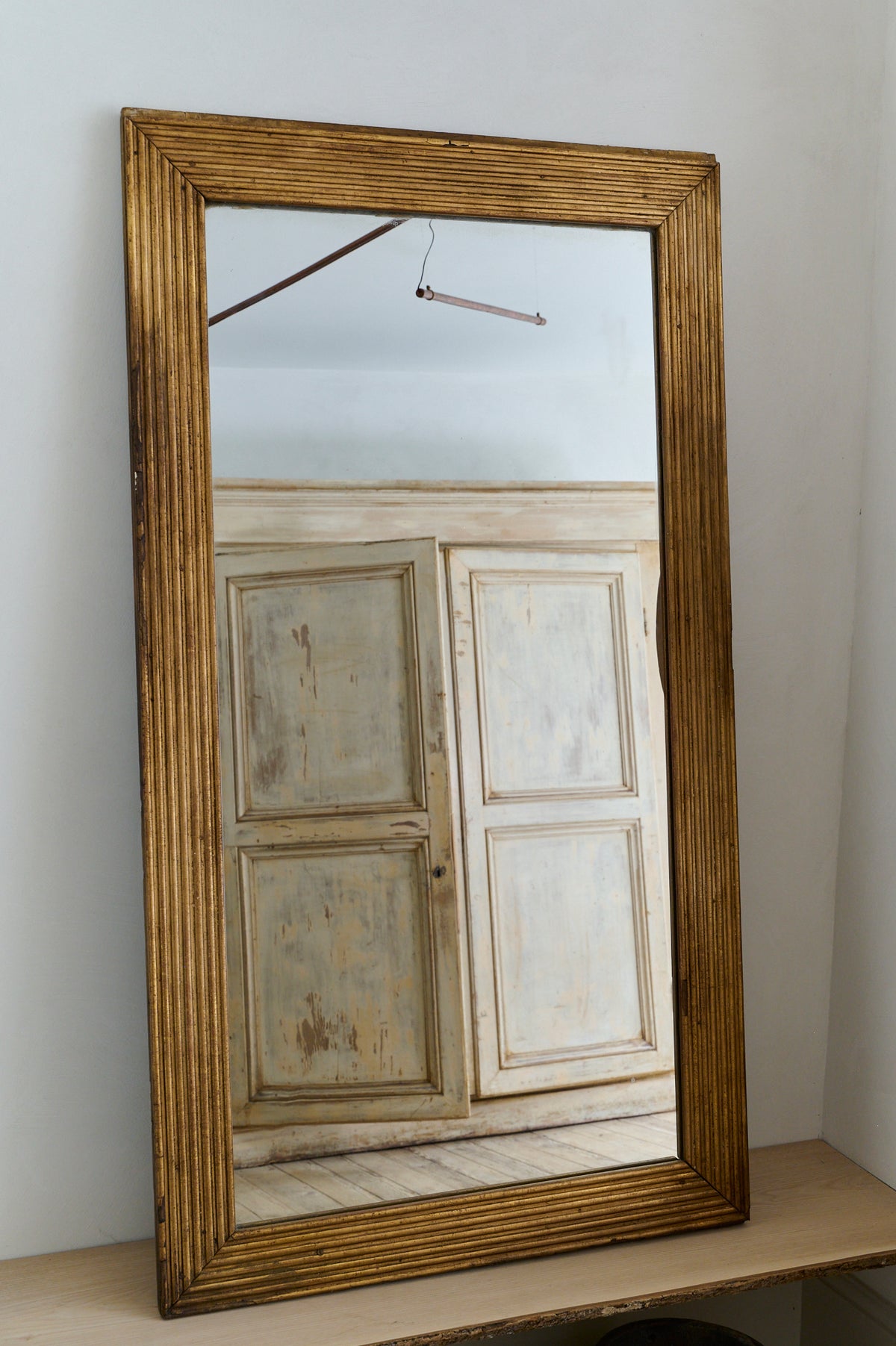 Fluted guilded mirror
