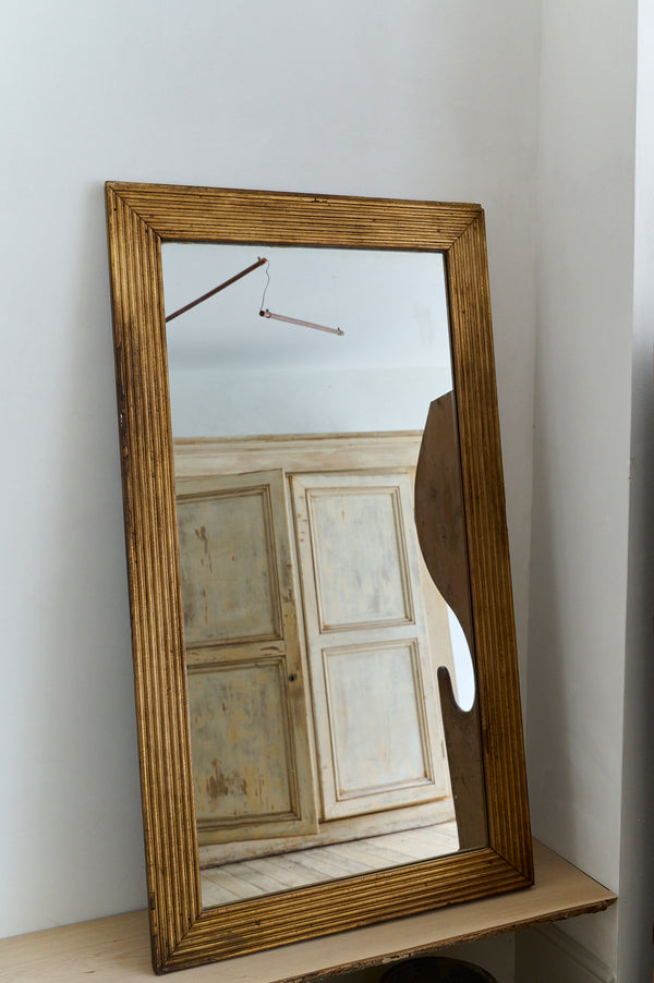 Fluted guilded mirror