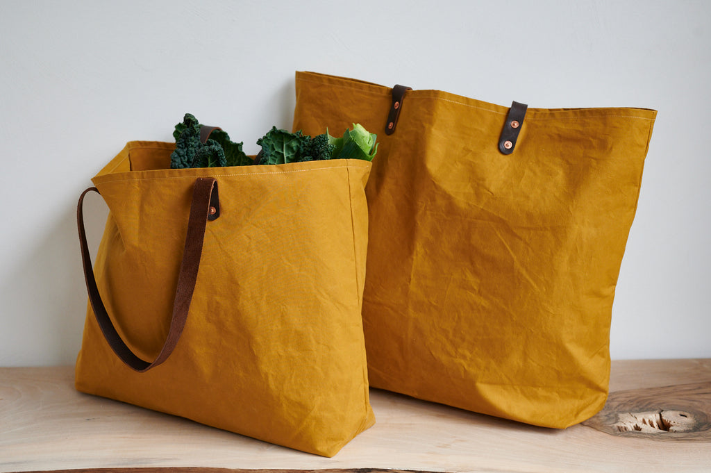 Waxed cotton yellow cumin bags in size medium and large