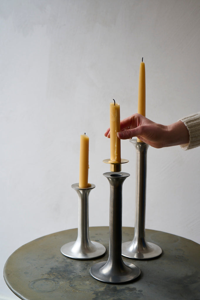 Pewter candlestick with removable candle holder