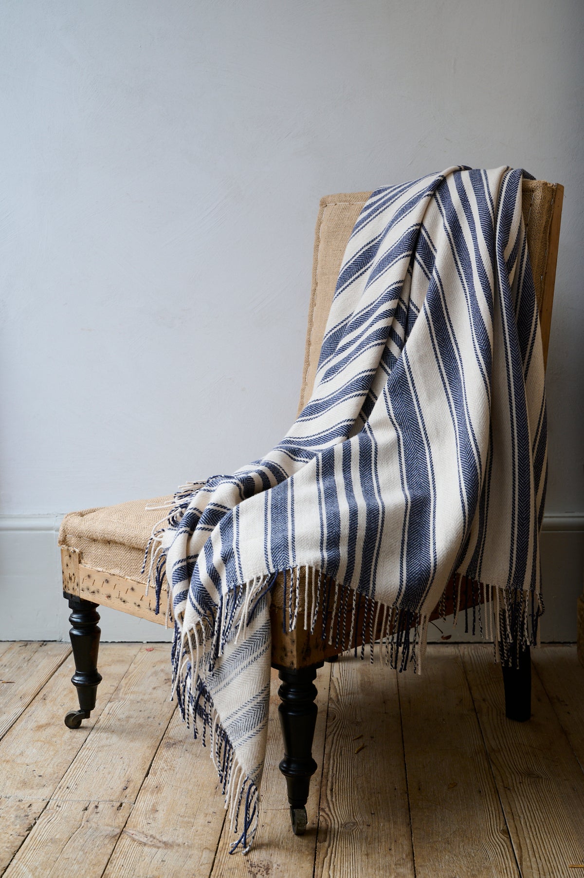 Super soft striped indigo blanket made in the UK