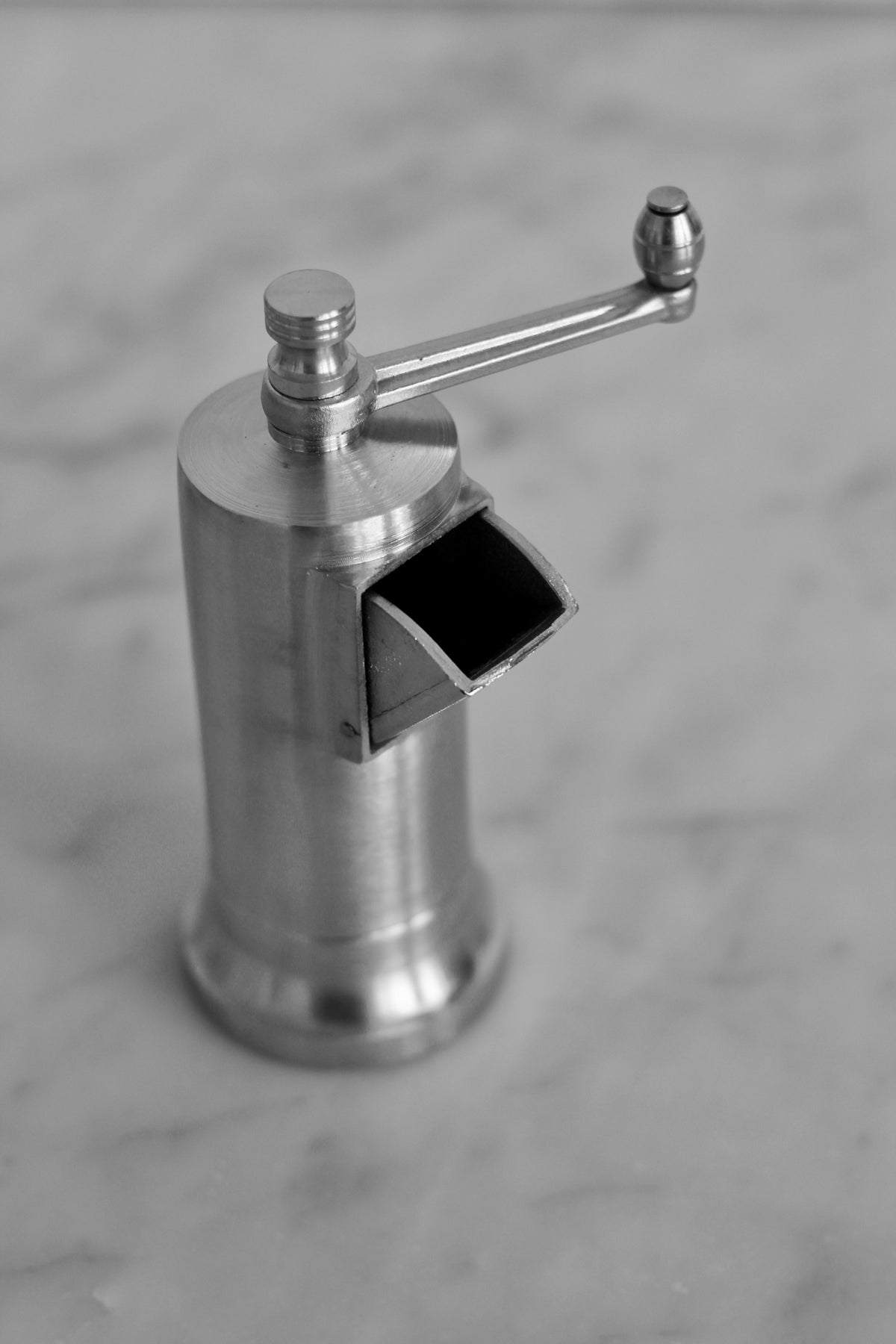 Nickel pepper mill with front opening for easy refill