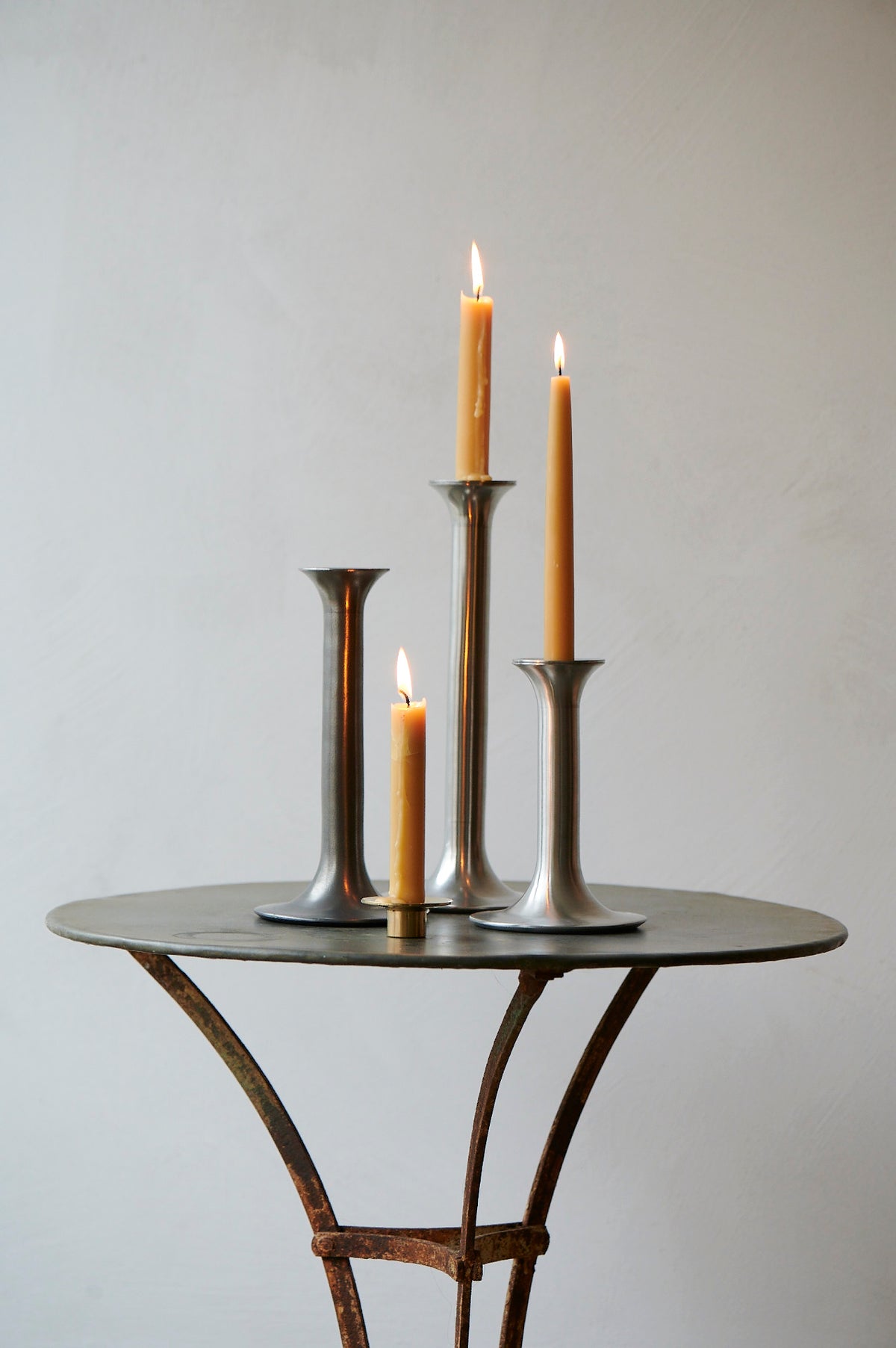 Pewter candlesticks with beeswax candles