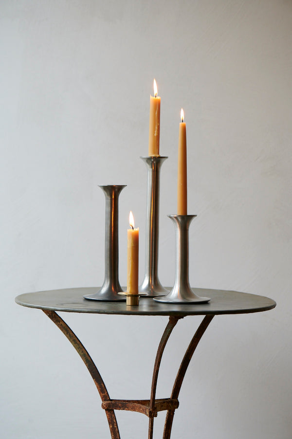 Pewter candlesticks with beeswax candles